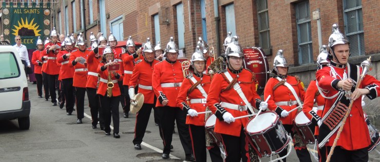 The Band of the West Midlands Fire and Rescue Service leading All Saint's Church in 2017